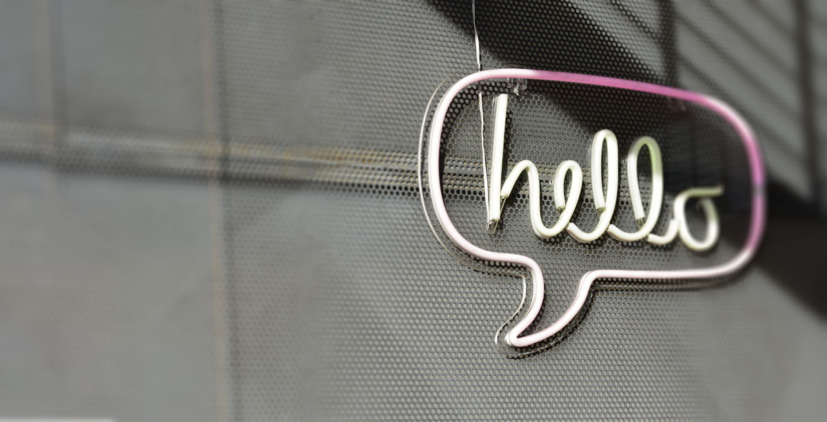 Neon speech bubble sign