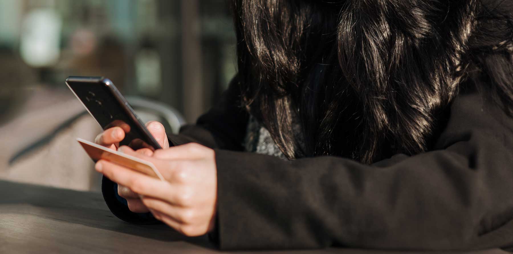 a woman using a cell phone